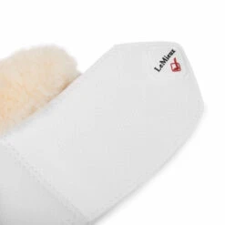 LeMieux Lambswool Overreach Boots -Horse Gear Shop lambswool bell boot white strap lemieux 73312.1638568731